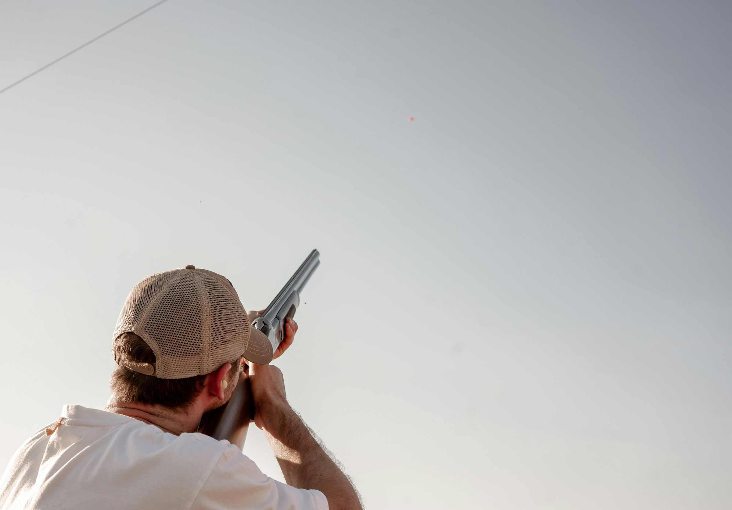 Clay shooter tracking a target